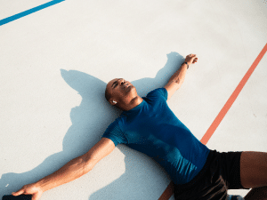 Image of an exhausted man mid workout