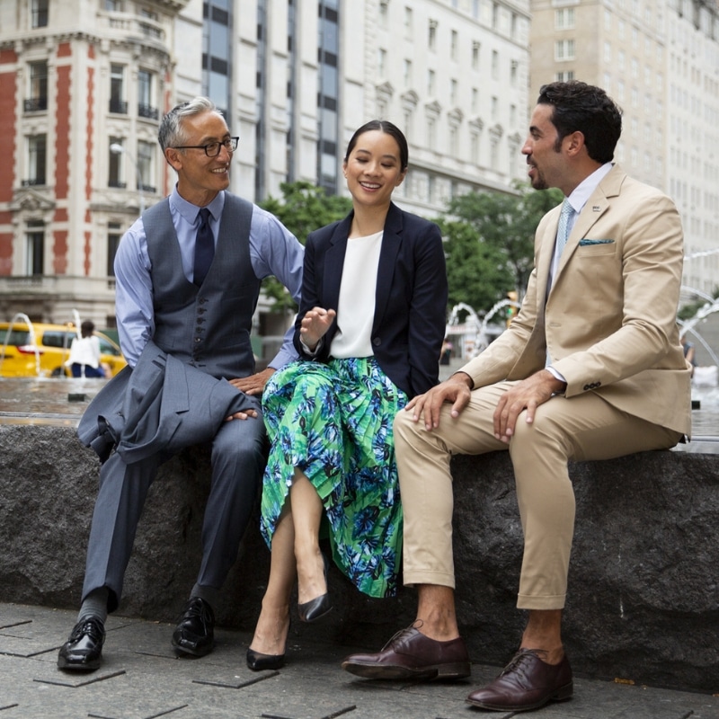 Image of a group of Associates chatting int New York City